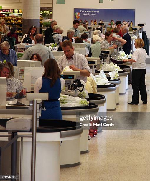 People shop in a supermarket in Bristol on July 15 2008 in Bristol, England. Official figures, released today, show inflation hit a 11-year high at...