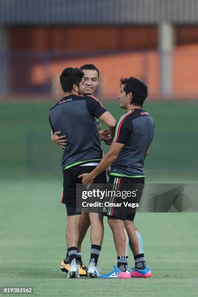 Players of Mexico make jokes during the Mexico National Team training session ahead it's match against Honduras at Grand Canyon University on July...