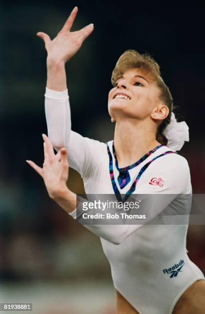 American gymnast Shannon Miller competes in the World Artistic Gymnastics Championships at the National Exhibition Centre in Birmingham, England in...