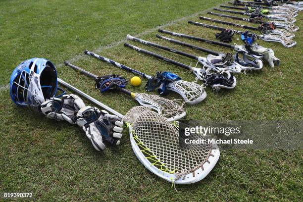 Detail shot of lacrosse sticks, gloves,helmets, eye protectors ahead of the classification match between Japan and Italy during the 2017 FIL...