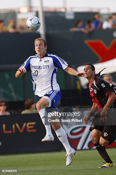 Tyson Wahl of the Kansas City Wizards heads the ball against Atlas A.C. During the game at Community America Ballpark on July 11, 2008 in Kansas...