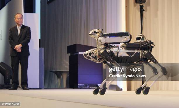 Spot Mini, a four-legged robot developed by U.S.-based robotics company Boston Dynamics, is on display at a SoftBank Group Corp. Event in Tokyo on...