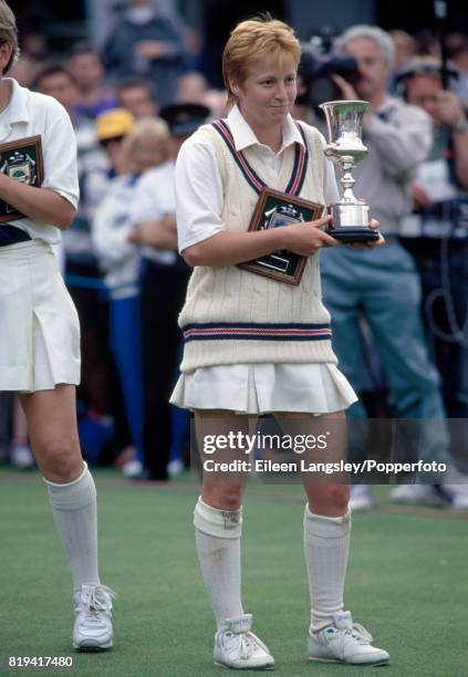 Karen Smithies, captain of the England women's cricket team, with the trophy after defeating New Zealand by 67 runs in the Women's Cricket World Cup...