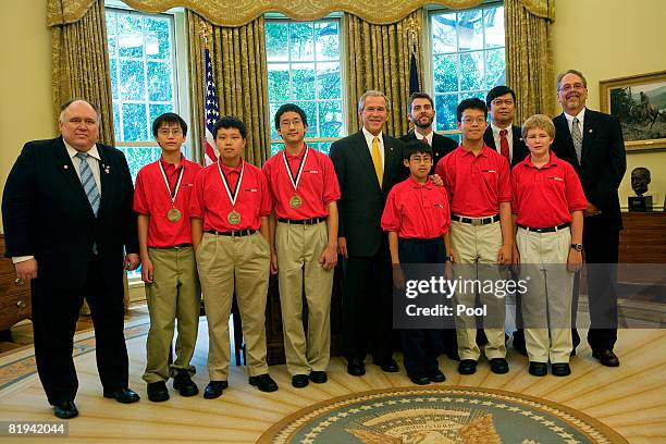 President George W. Bush participates in a photo opportunity with recipients of the 2008 MATHCOUNTS National Competition Award in the Oval Office of...