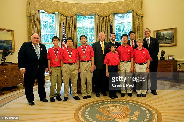 President George W. Bush participates in a photo opportunity with recipients of the 2008 MATHCOUNTS National Competition Award in the Oval Office of...