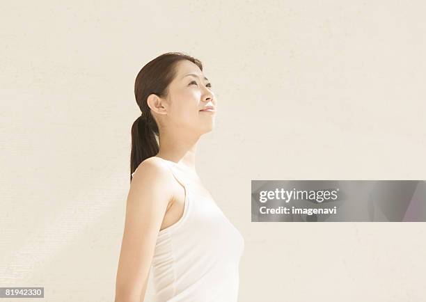 a young woman - camisole stockfoto's en -beelden