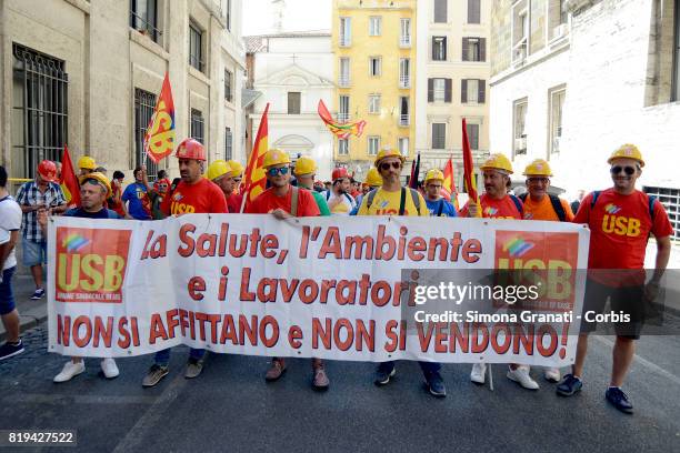 Workers of ILVA steelworks protest at the Ministry of Economic Development against the sale of steel producer Ilva to ArcelorMittal, on July 20, 2017...