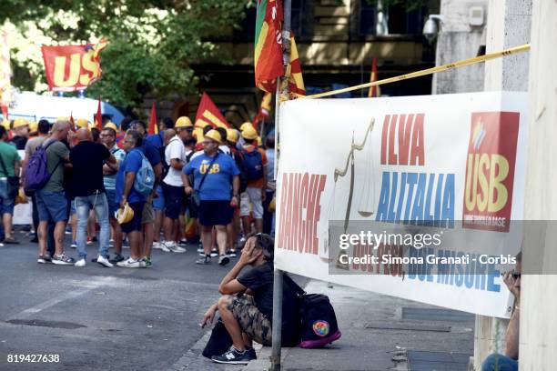 Workers of ILVA steelworks protest at the Ministry of Economic Development against the sale of steel producer Ilva to ArcelorMittal, on July 20, 2017...