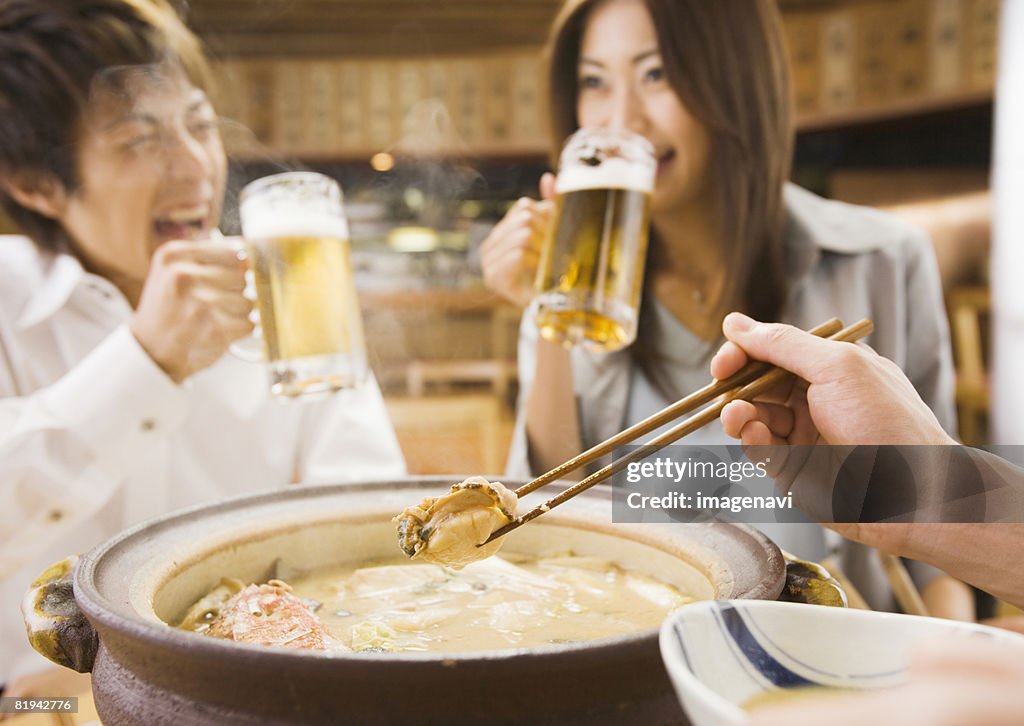 Group of Young People Enjoying Drinks