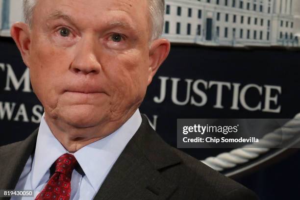 Attorney General Jeff Sessions holds a news conference to announce an 'international cybercrime enforcement action' at the Department of Justice July...