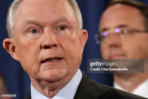 Attorney General Jeff Sessions , Deputy Attorney General Rod Rosenstein and other law enforcement officials hold a news conference to announce an...