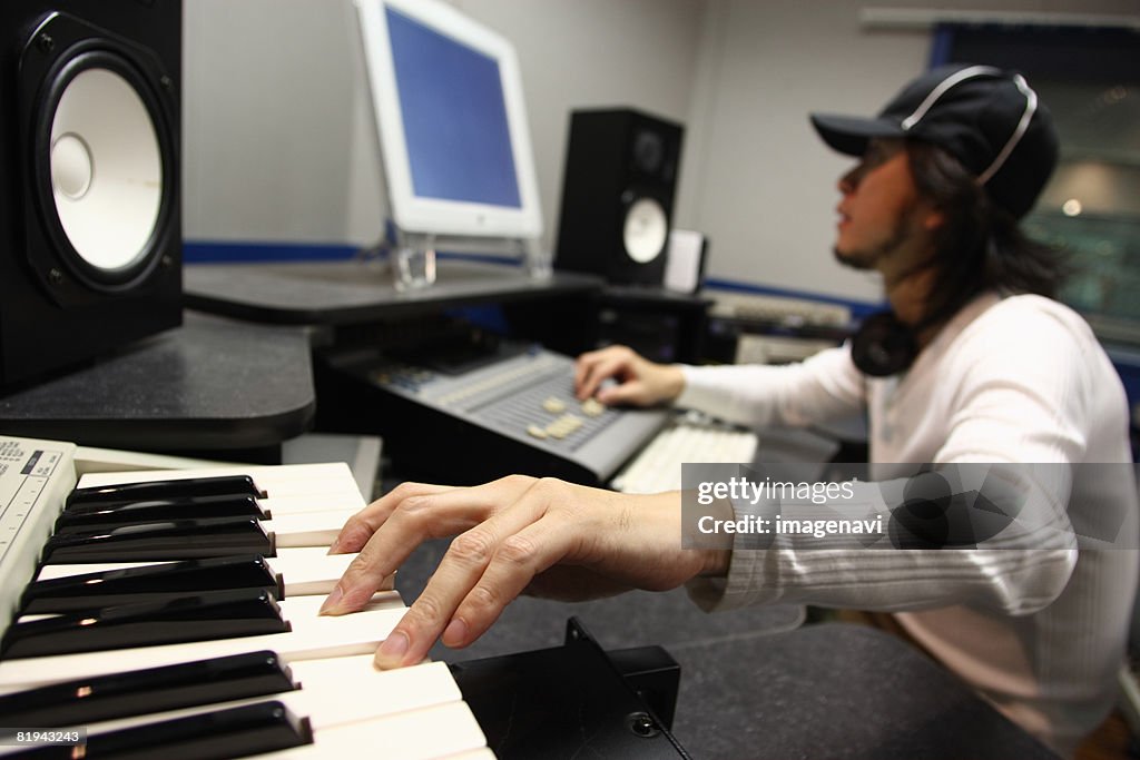 Man working with sound mixer