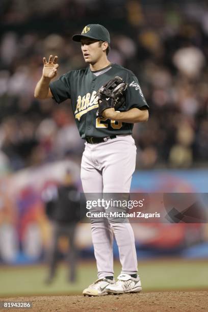 Huston Street of the Oakland Athletics pitches during the MLB game against the San Francisco Giants at AT&T Park in San Francisco, California on June...