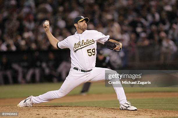 Andrew Brown of the Oakland Athletics pitches during the game against the New York Yankees at McAfee Coliseum in Oakland, California on June 12,...