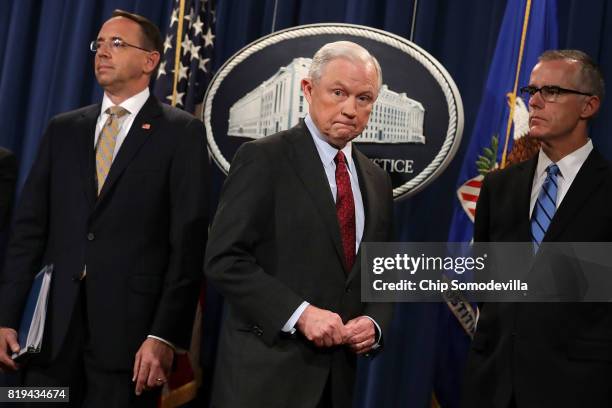 Deputy Attorney General Rod Rosenstein, U.S. Attorney General Jeff Sessions, Acting FBI Director Andrew McCabe other law enforcement officials hold a...