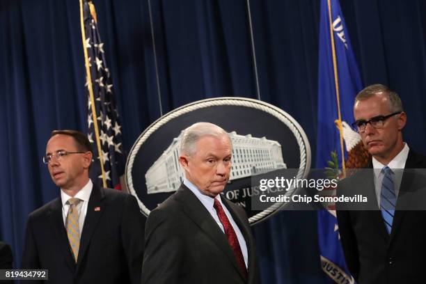 Deputy Attorney General Rod Rosenstein, U.S. Attorney General Jeff Sessions, Acting FBI Director Andrew McCabe other law enforcement officials hold a...