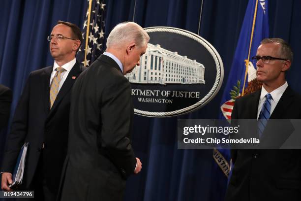 Deputy Attorney General Rod Rosenstein, U.S. Attorney General Jeff Sessions, Acting FBI Director Andrew McCabe other law enforcement officials hold a...