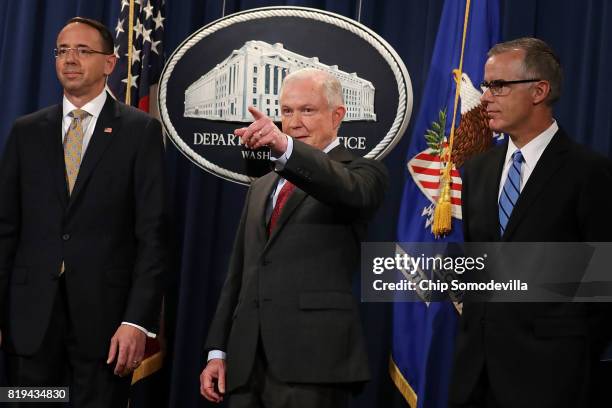 Deputy Attorney General Rod Rosenstein, U.S. Attorney General Jeff Sessions, Acting FBI Director Andrew McCabe other law enforcement officials hold a...