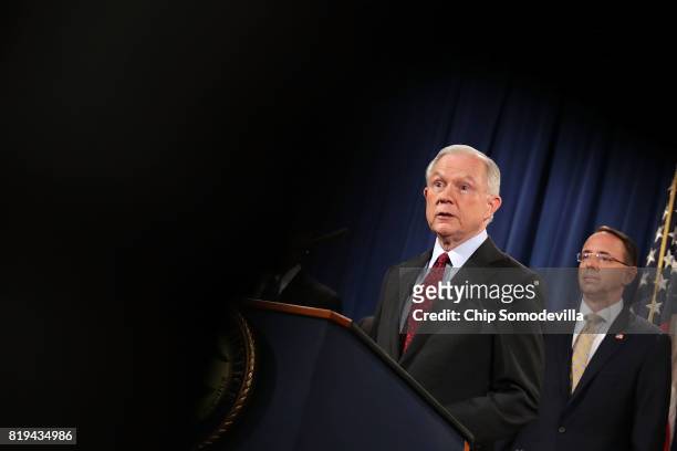 Attorney General Jeff Sessions , Deputy Attorney General Rod Rosenstein and other law enforcement officials hold a news conference to announce an...
