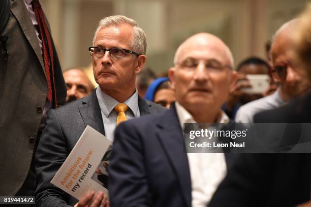 Brian Paddock holds a copy of new Liberal Democrats leader Vince Cable's manifesto ahead of the press conference at the St Ermin's Hotel on July 20,...