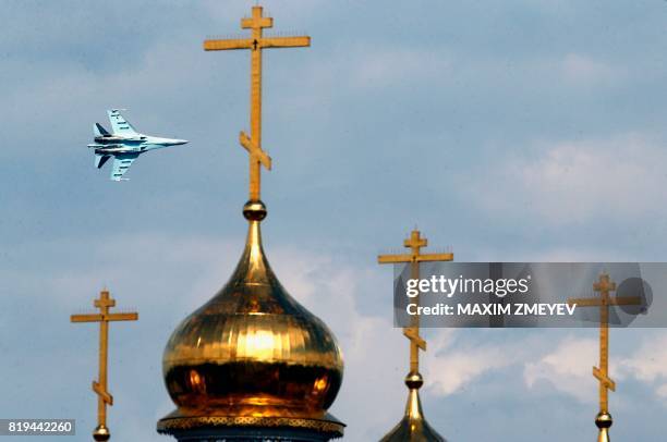 Russian SU-27 fighter performs during an exhibition flight at the annual air show MAKS 2017 in Zhukovsky, some 40kms outside Moscow on July 20, 2017.