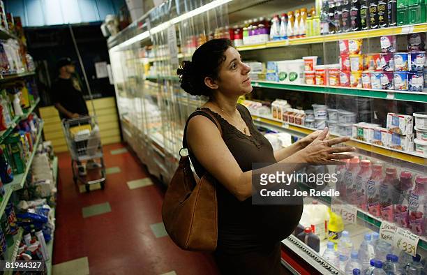 Regiane Naujock shops for groceries at Lorenzo's Supermarket July 15, 2008 in North Miami, Florida. The Labor Department reported that wholesale...
