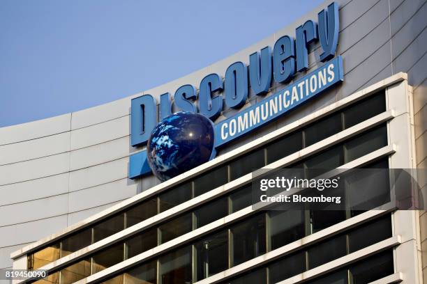 Signage is displayed on the exterior of Discovery Communications Inc. Headquarters in Silver Spring, Maryland, U.S., on Thursday, July 20, 2017....