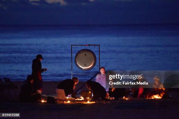 People pay their respects during a vigil for Justine Damond at Freshwater Beach on July 19, 2017 in Sydney, Australia. Ms Damond was shot dead by...