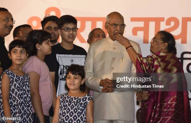 Wife Savita Kovind, family members and grand children offering sweets to Ram Nath Kovind after his win in Presidential election at 10 Akbar Road on...