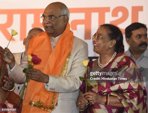 Ram Nath Kovind with his wife Savita Kovind received great flower after his win in Presidential election at 10 Akbar Road on July 20, 2017 in New...