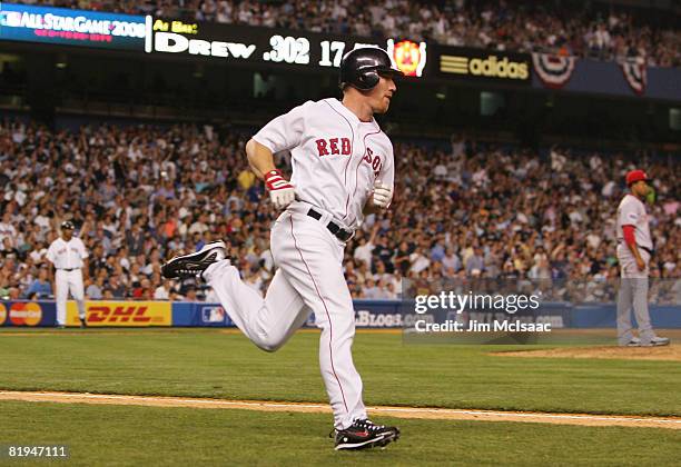 American League All-Star J.D. Drew of the Boston Red Sox rounds the bases after hitting a two run homer off of National League All-Star Edinson...