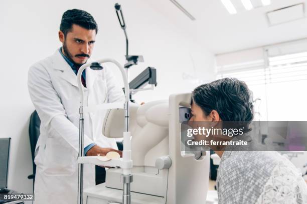 eye check up - retinal scan stock pictures, royalty-free photos & images