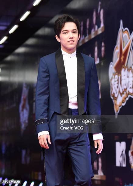 Singer Dimash Kudaibergen arrives at the red carpet of 2017 MTV Global Mandarin Music Awards on July 20, 2017 in Shenzhen, Guangdong Province of...