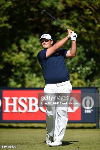 Golfer Patrick Reed watches his shot from the 5th tee during his opening round on the first day of the Open Golf Championship at Royal Birkdale golf...