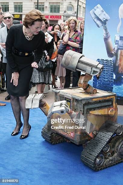 Sigourney Weaver and a model of the character 'Wall.E' attend the UK Premiere of WALL-E at Empire Cinema on July 13, 2008 in London, England.