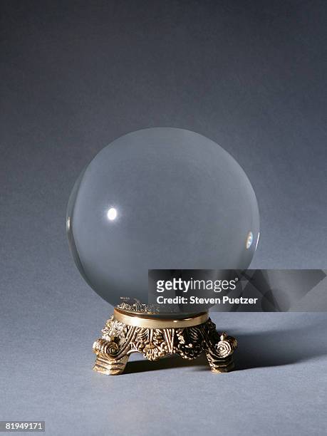 crystal ball against gray background - 水晶 ストックフォトと画像