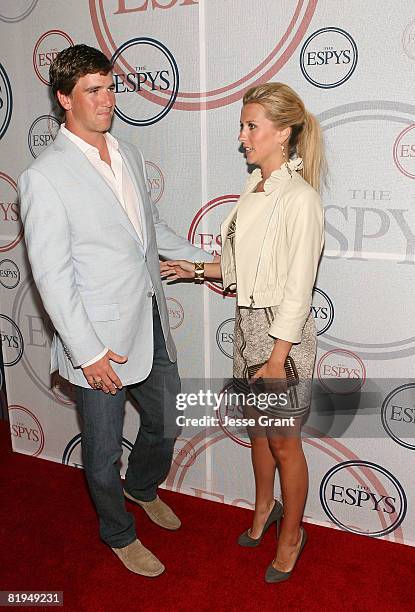 Quarterback Eli Manning and his wife Abby McGrew arrive at the 2008 ESPYs Giant Event Hosted by Eli Manning held at J Bar and Lounge on July 15, 2008...