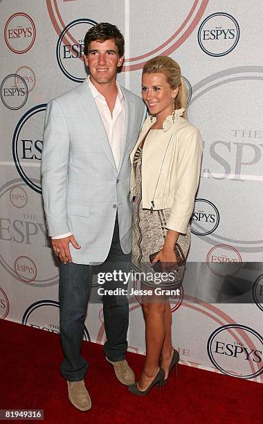 Quarterback Eli Manning and his wife Abby McGrew arrive at the 2008 ESPYs Giant Event Hosted by Eli Manning held at J Bar and Lounge on July 15, 2008...