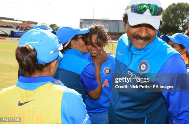 India Women's Harmanpreet Kaur is congratulated by team-mates after an innings score of 171 not out during the ICC Women's World Cup Semi Final match...