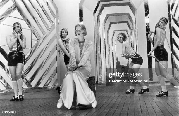 English model and actress Twiggy as Polly Browne with dancers in a scene from the fim version of Sandy Wilson's musical 'The Boy Friend', directed by...