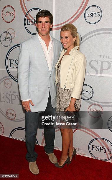 Quarterback Eli Manning and his wife Abby McGrew arrive at the 2008 ESPYs Giant Event Hosted by Eli Manning held at J Bar and Lounge on July 15, 2008...