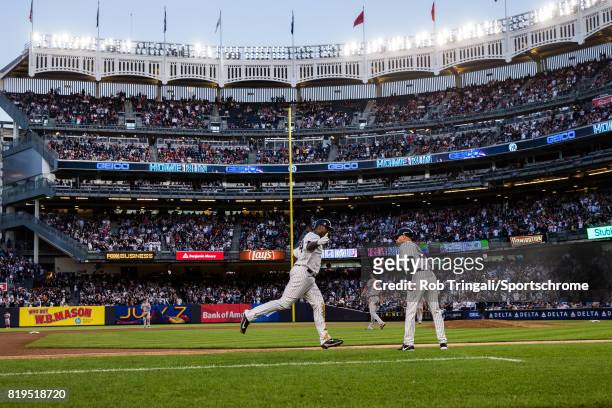 Chris Carter of the New York Yankees round the bases after hitting a home run during the game Boston Red Sox at Yankee Stadium on June 7, 2017 in the...