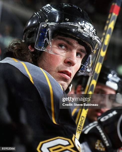 Jaromir Jagr of the Pittsburgh Penguins watches action from bench during game against the Boston Bruins at the Fleet Center.