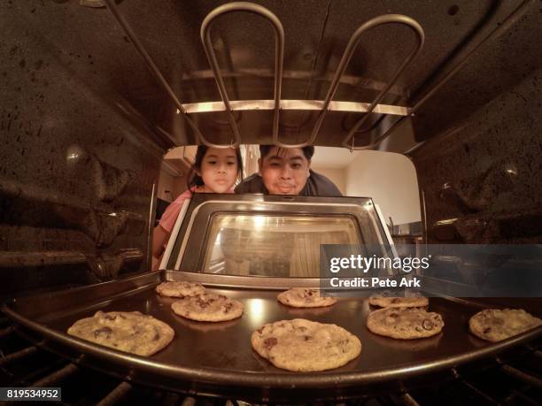 baking cookies - inside of oven stock pictures, royalty-free photos & images