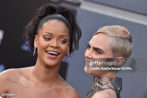 Singer/actress Rihanna and model/actress Cara Delevingne arrive at the Los Angeles premiere of 'Valerian and the City of a Thousand Planets' at TCL...