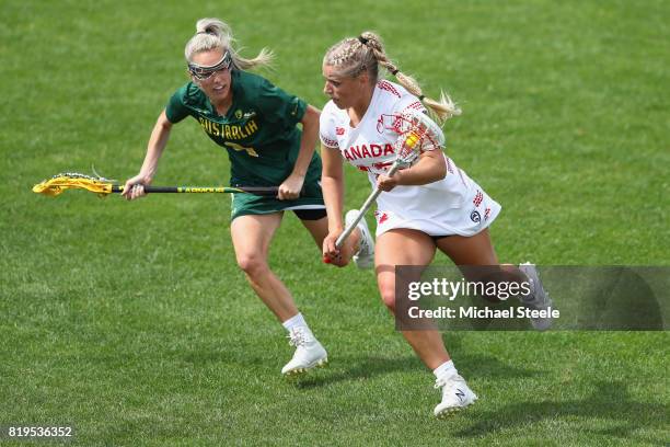 Lydia Sutton of Canada is tracked by Sarah Mollison of Australia during the semi-final match between Australia and Canada during the 2017 FIL...