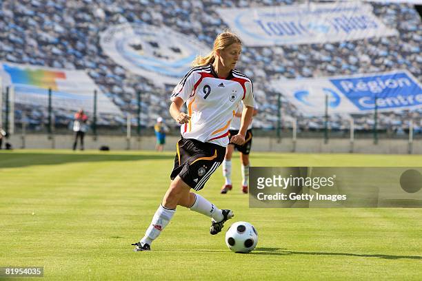 Marie Pollmann of Germany runs with the ball during the Women's U19 European Championship match between Germany and Norway at Valle du Cher stadium...