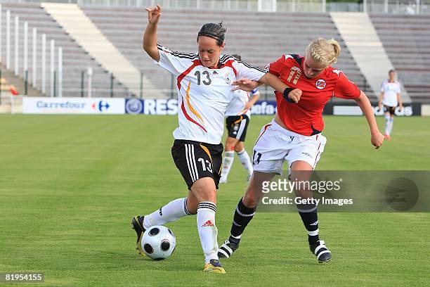 Lisa Schwab of Germany and June Tames of Norway fight for the ball during the Women's U19 European Championship match between Germany and Norway at...