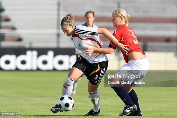 Kim Kulig of Germany and Caroline Walde of Norway fight for the ball during the Women's U19 European Championship match between Germany and Norway at...