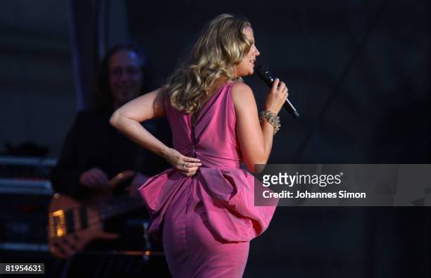 Singer and TV hostess Barbara Schoeneberger performs on stage during the Thurn and Taxis Castle Summer Festival on July 16, 2008 in Regensburg,...